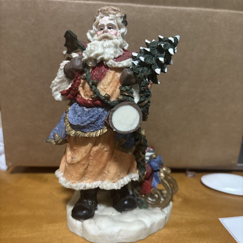 Christmas Santa Figurine With Toys, Sled And Christmas Tree 7” X 4 “